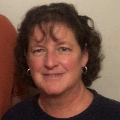 tami-morehouse woman with short brown hair
